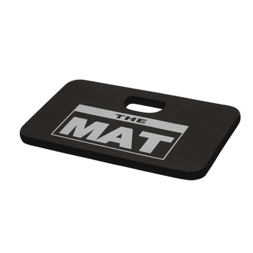 Black rectangular kneeling mat with a built-in carry handle and large white 'THE MAT' logo on top.