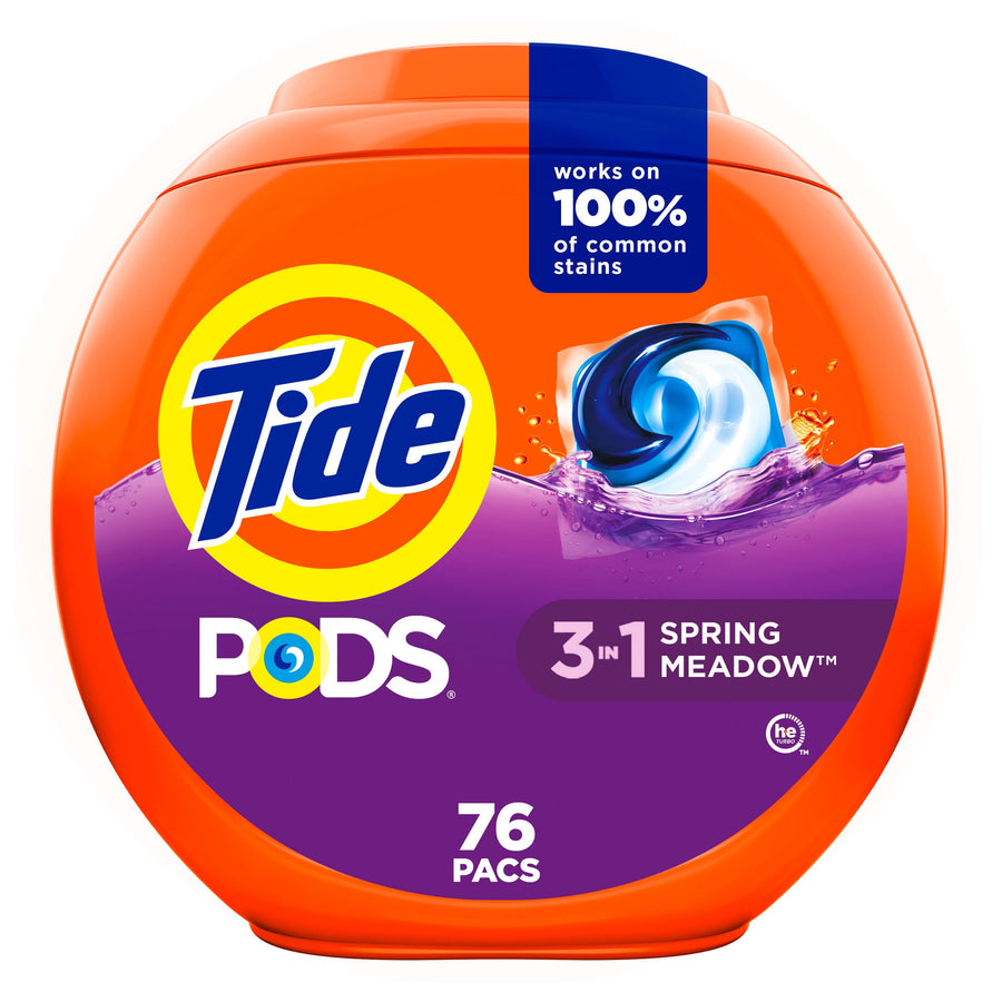 Round orange Tide PODS container labeled 3-in-1 Spring Meadow with purple panel and 76 pacs count