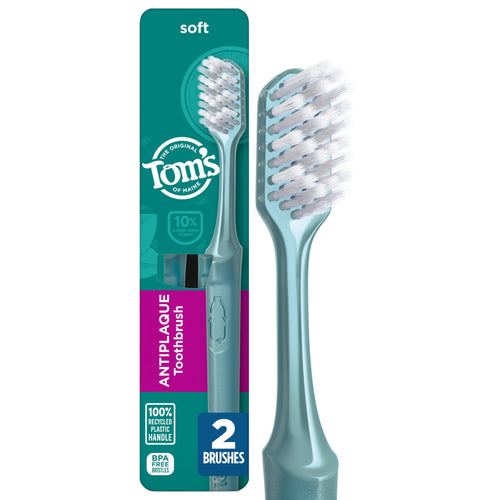 Tom’s of Maine soft antiplaque toothbrush in retail blister pack showing teal handle and bristles