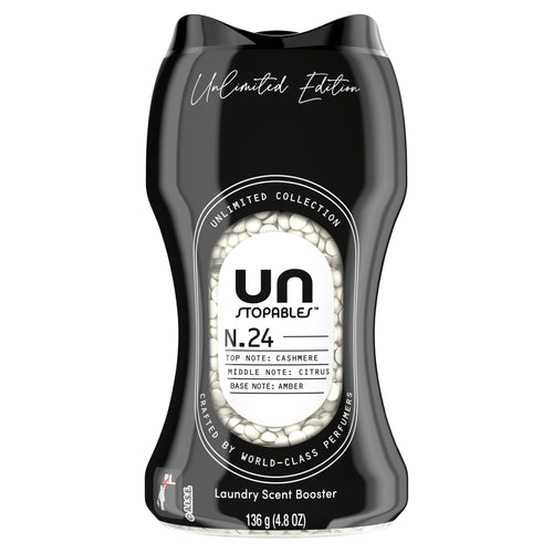 Close-up product shot of a black Unstopables N.24 laundry scent booster bottle showing label and visible white beads.