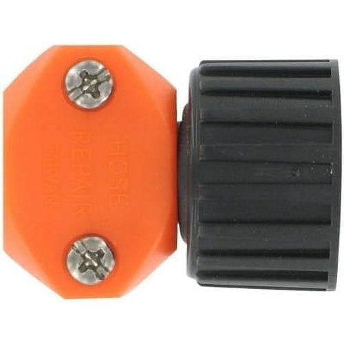 Close-up of an orange plastic Valterra hose fixer component with two metal screws and a ribbed black connector
