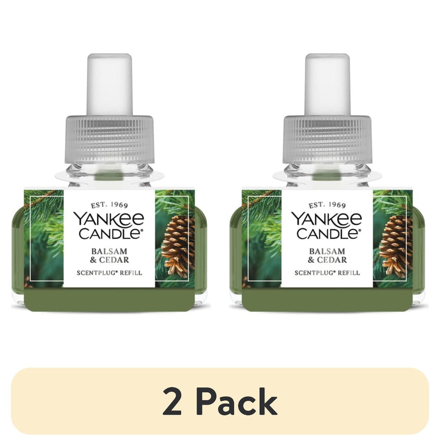Two Yankee Candle Balsam & Cedar ScentPlug refill bottles with green liquid and label, shown side by side over a '2 Pack' banner.