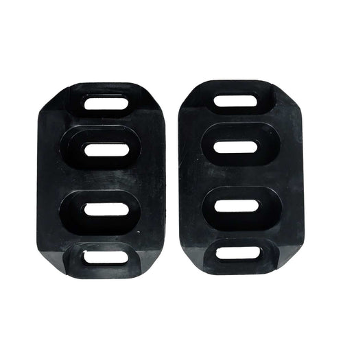 Pair of black reversible poly skid shoes with three oval slots each, shown on white background