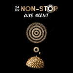 Graphic showing '24 HR Non-Stop Luxe Scent' text above concentric golden dust rings and a textured golden dome on black.
