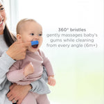 Adult using a blue silicone finger toothbrush to clean a baby’s mouth, with text describing 360° bristles on the right.