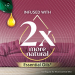 Graphic panel stating "Infused with 2x more natural Essential Oils" over a living room scene with a sofa background