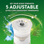Top view of Air Wick warmer adjustment dial with text 'Set your scent strength 5 adjustable levels' on green background