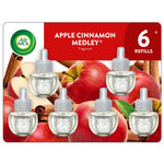Air Wick Apple Cinnamon Medley six-refill blister card showing six clear plug-in oil refills with apples and cinnamon background