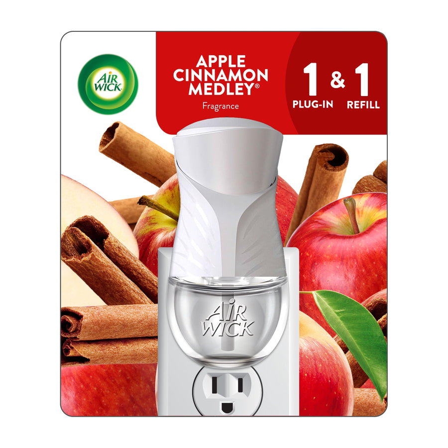 Air Wick plug-in warmer and refill on packaging with apples and cinnamon sticks, Apple Cinnamon Medley branding.