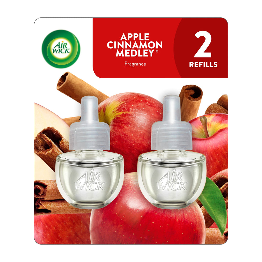Air Wick apple cinnamon medley scented oil refill twin bottles on product blister card with apples and cinnamon sticks graphic