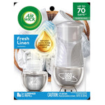 Retail blister pack showing Air Wick plug-in warmer and refill bottle with fresh linen imagery and product badge.