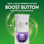 Plug-in warmer front view with highlighted boost button and copy ‘Tap the boost button for instant fragrance’ on green background