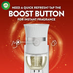 Air Wick plug-in warmer front view infographic with headline need a quick refresh tap the boost button and illustrated touch icon