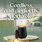 Black cordless diffuser and a single amber refill displayed on a small table with stylized home interior backdrop and promotional text