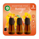 Three amber refill bottles with brown caps on orange hibiscus and papaya background, Air Wick Essential Mist refill packaging