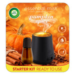 Air Wick Essential Mist pumpkin spice diffuser and amber oil refill shown on warm autumn background with pumpkins and cinnamon sticks.
