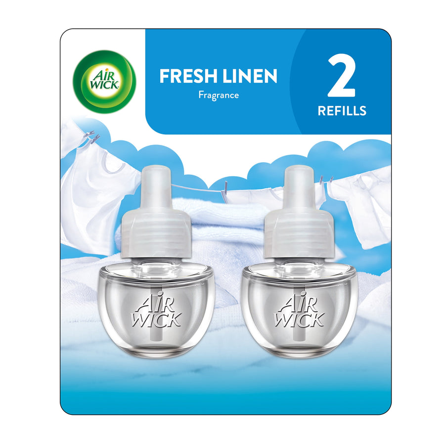 Two clear Air Wick plug-in scented oil refill bottles displayed on Fresh Linen branded blister card with laundry imagery