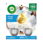 Air Wick Fresh Linen packaging showing two refill bottles, laundry basket background and callout for up to 140 days