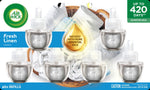 Air Wick Fresh Linen six refill bottles displayed over a laundry basket with infused oils droplet badge
