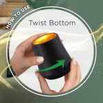 How-to graphic showing hands twisting the bottom of a black Air Wick diffuser with caption "Twist Bottom"