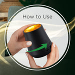 Instructional image showing hands twisting an Air Wick diffuser with an arrow indicating how to use the device