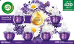 Air Wick lavender & chamomile refill bottles displayed with chamomile and lavender flowers and an 'infused with pure essential oils' drop graphic