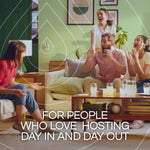 Living room scene with a group of people socializing and an Air Wick plug-in visible on the wall, caption about hosting