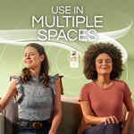 Two people sitting and enjoying fragrance from an Air Wick plug-in device shown on a wall outlet with text use in multiple spaces