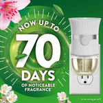 Air Wick plug-in warmer inserted in outlet with large "now up to 70 days" promotional graphic