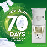 Air Wick plug-in warmer device shown in outlet with text highlighting up to 70 days of noticeable fragrance on green background
