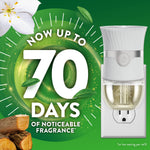 Air Wick plug-in warmer shown plugged in with text promoting up to 70 days of noticeable fragrance on green background.