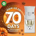 Air Wick plug-in warmer with promotional text 'Now up to 70 days' over pumpkin spice themed background