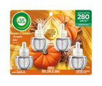 Air Wick blister pack photo of four pumpkin spice plug‑in oil refills with pumpkins and spice graphics