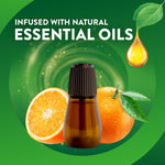 Amber refill bottle pictured with whole and halved oranges and text infused with natural essential oils on green background