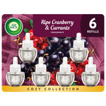 Air Wick ripe cranberry & currants refill six-pack packaging with six clear oil refill bottles and berry background