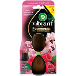 Packaged Air Wick Vibrant essential mist refill with visible brown refill bottle and floral raspberry artwork on card