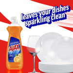 Ajax Ultra bottle beside stacked clean plates and a sparkling wine glass with headline “leaves your dishes sparkling clean” on red and white art.