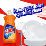 Ajax Ultra orange dish soap bottle beside sparkling plates and a wine glass with slogan about leaving dishes sparkling clean