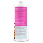 Rear label view of Alaska Morbloom bottle showing application instructions and guaranteed analysis panel on pink background