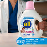 Close-up of an all baby detergent bottle with pink cap held by a person in medical attire and a banner reading 'Pediatrician Tested'
