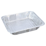 Single disposable aluminum half steam pan photographed at an angle showing ribbed sides and textured bottom