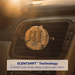 Amber-toned Scent Theory vent diffuser mounted on a car air vent with SCENTSHIFT technology callout