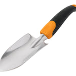 Angled close-up of a Fiskars trowel blade and ergonomic black-and-orange handle on a white background