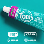 Angled close-up of a Tom’s of Maine toothpaste tube showing the brand logo and certification icons like vegan and gluten free.