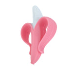 Angled view of a pink Nuby NanaNubs banana-shaped silicone massaging toothbrush on white