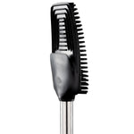 Angled side view of a black rubber brush head showing rows of bristles and a stainless steel handle