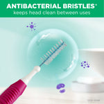 Graphic highlighting 'Antibacterial bristles keeps head clean between uses' with a proxabrush head and stylized microbes