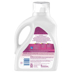 Rear view of Ariel Ultra Concentrado detergent bottle showing back label with usage instructions and barcode on white background.