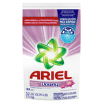 Studio photo of an Ariel powder detergent bag with Downy branding, showing 52 oz (1.5 kg) label and pink rays background.