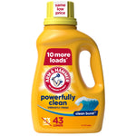 Yellow Arm & Hammer liquid laundry detergent bottle labeled 'powerfully clean' with Clean Burst wave graphic and measuring-cap top.